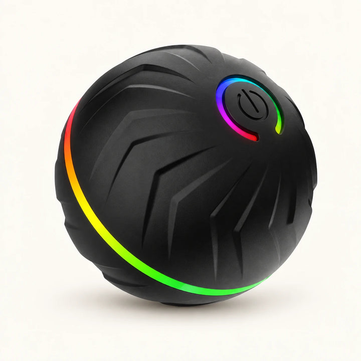 Black PetTumbly rolling dog ball showing molded grooves, power button and multicolor light band