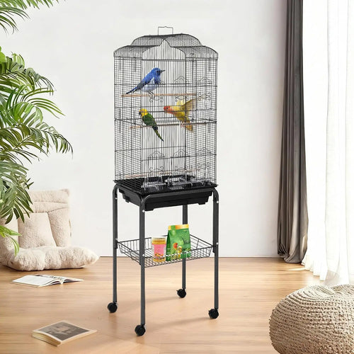 Black rounded-top bird cage on wheeled stand in a bright room
