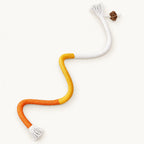 Orange, yellow and white cat rope toy with tassels — studio view