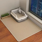Khaki double-layer honeycomb cat litter mat shown beside a litter tray
