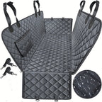 Black quilted hammock dog car seat cover, showing headrest straps, side panels, pockets and two tethers