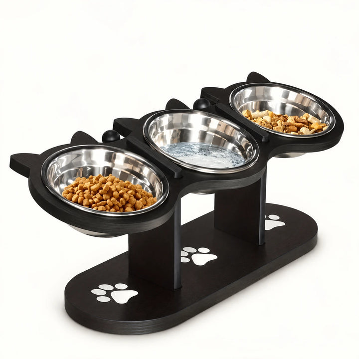 Black elevated three-bowl pet feeder with stainless bowls, cat-ear rims and white paw-print base